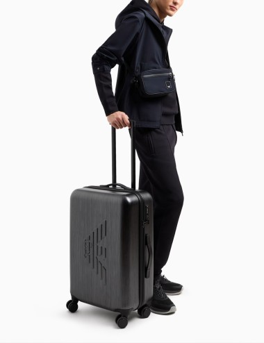 ABS medium trolley suitcase with oversized, embossed eagle gray